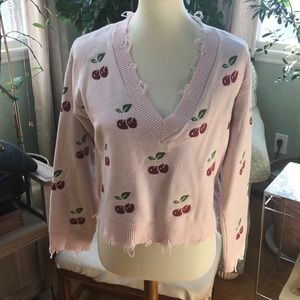 Bailey Rose Cherry Pattern sweater.